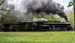 RBMN 2102 in profile at Hecla.  Railroad President Andy Muller at the throttle